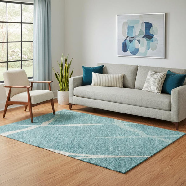 HomeRoots 5' X 8' Teal and Ivory Abstract Geometric Washable Area Rug – Durable, Stylish, and UV Protected! 682315