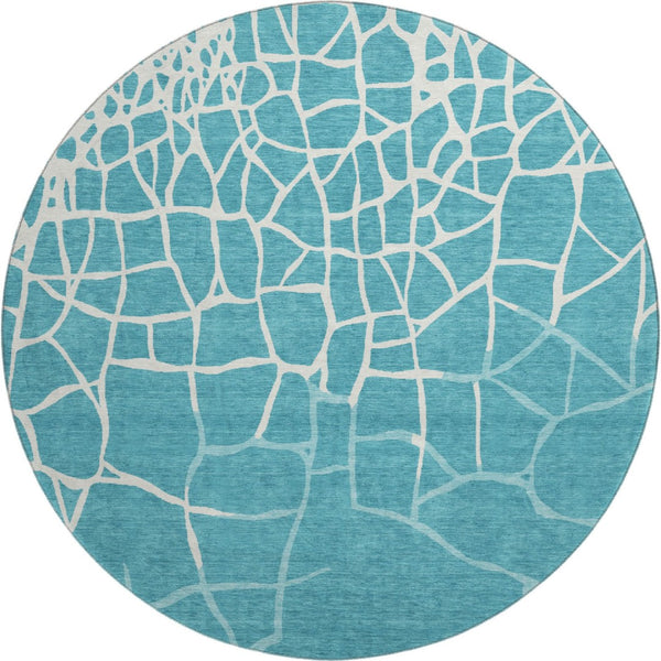 HomeRoots 8' Teal and Ivory Abstract Geometric Round Rug - Washable, UV Protected, Perfect for Active Homes! 682316