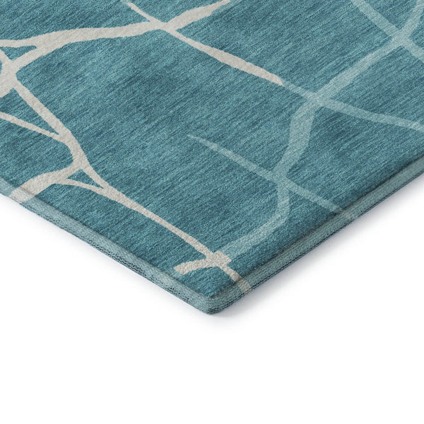 HomeRoots 8' Teal and Ivory Abstract Geometric Round Rug - Washable, UV Protected, Perfect for Active Homes! 682316