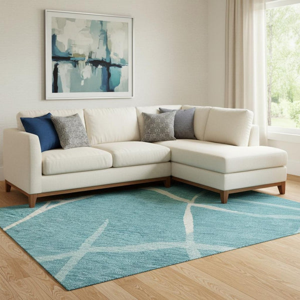 HomeRoots 10' X 14' Teal and Ivory Abstract Geometric Area Rug - Washable, UV Protected for Busy Homes! 682319
