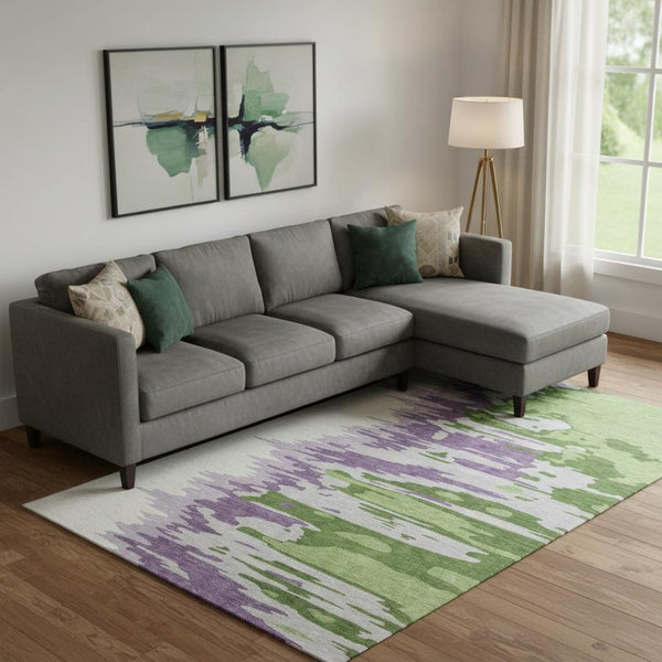 HomeRoots 9' X 12' Abstract Area Rug in Green, Purple & Ivory - Washable, UV-Protected, Pet-Friendly Design 682354