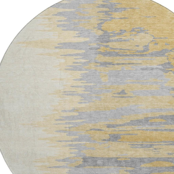 HomeRoots 8' Gold Ivory and Gray Abstract Round Rug - Washable, UV Protected, Ideal for High-Traffic Areas 682358