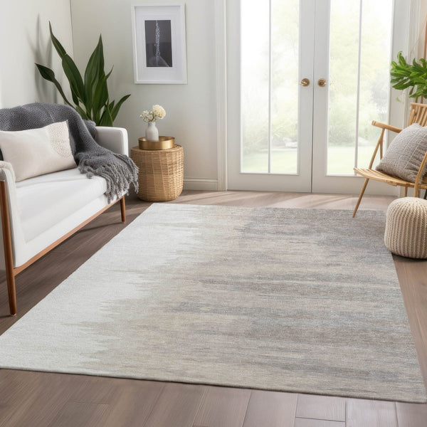 HomeRoots 5' X 8' Ivory and Beige Abstract Washable Area Rug - UV Protected, Durable, and Family-Friendly Design 682369