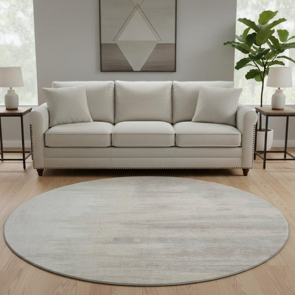HomeRoots 8' Ivory and Beige Abstract Round Rug - Washable, UV Protected, Pet-Friendly, Modern Home Decor 682370