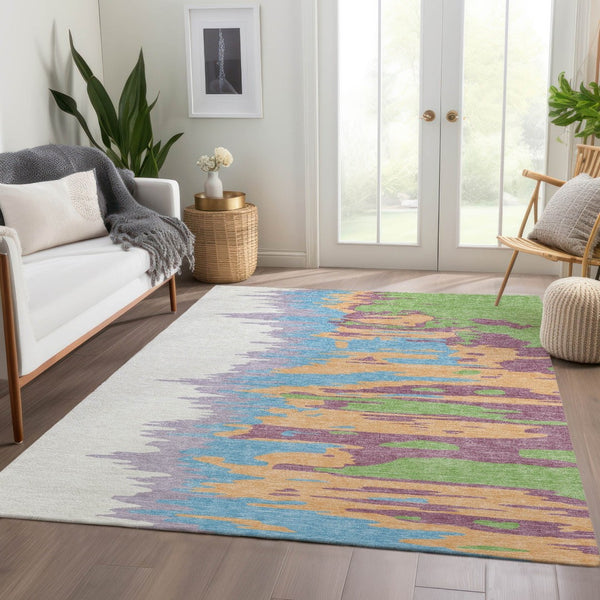 HomeRoots 5' X 8' Abstract Washable Area Rug in Peach, Green & Blue - UV Protected, Stain Resistant & Stylish 682381