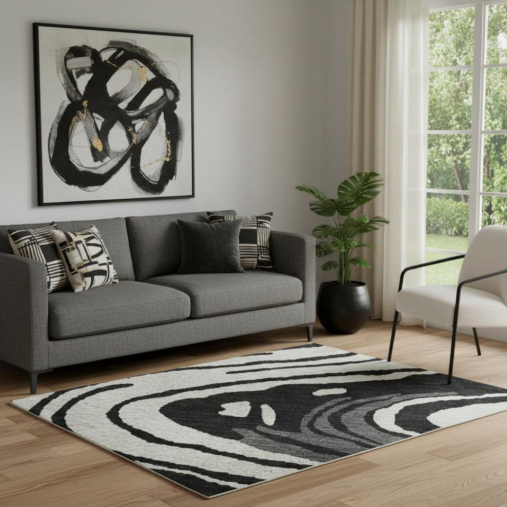 HomeRoots 5' X 8' Contemporary Black Ivory Gray Abstract Area Rug - Washable, UV-Protected, Durable Design 682399