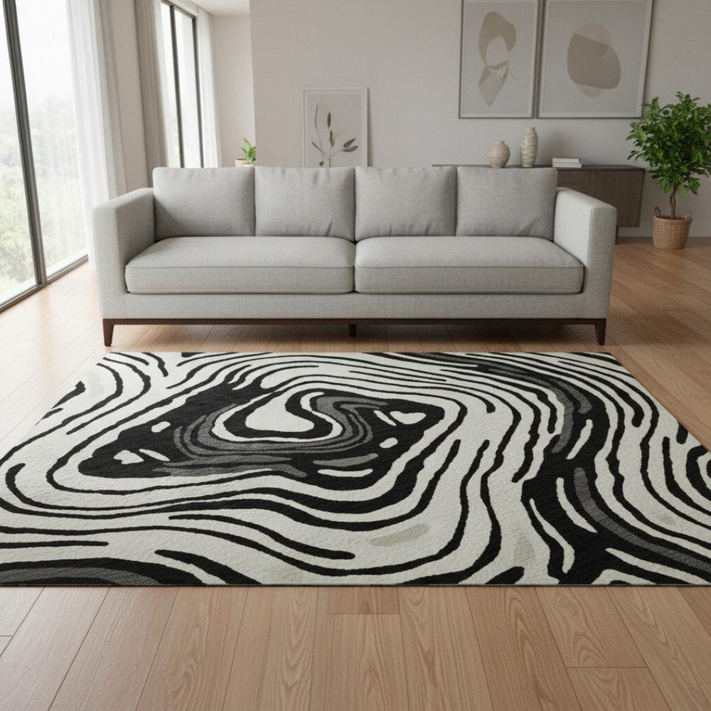 HomeRoots 8' Black Ivory and Gray Abstract Round Rug - Washable, UV Protected, Ideal for High-Traffic Areas 682400