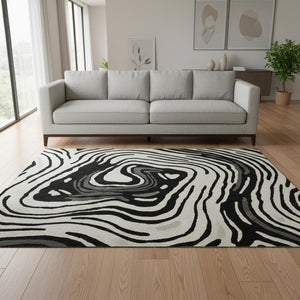 HomeRoots 8' Black Ivory and Gray Abstract Round Rug - Washable, UV Protected, Ideal for High-Traffic Areas 682400