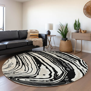 HomeRoots 8' Black Ivory and Gray Abstract Round Rug - Washable, UV Protected, Ideal for High-Traffic Areas 682400
