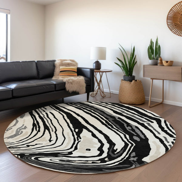 HomeRoots 8' Black Ivory and Gray Abstract Round Rug - Washable, UV Protected, Ideal for High-Traffic Areas 682400