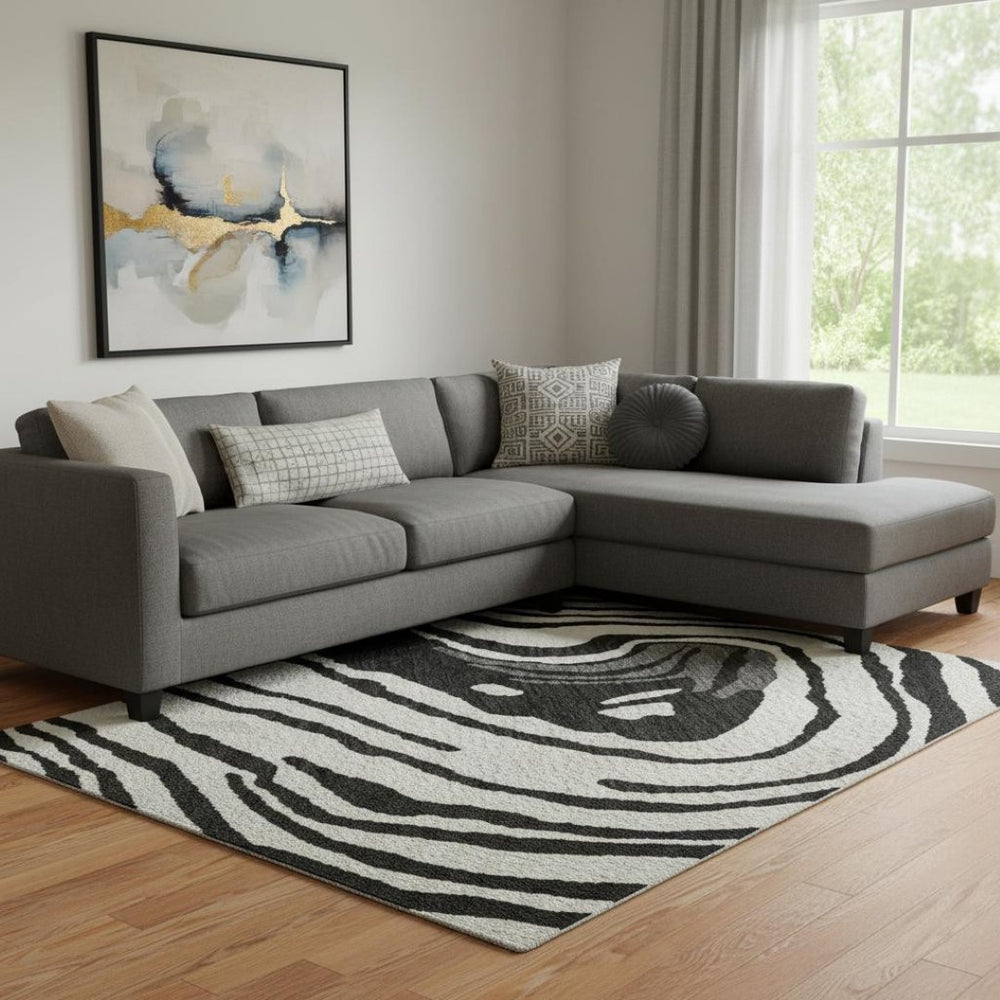 HomeRoots 10' X 14' Modern Abstract Washable Area Rug in Black, Ivory & Gray - UV Protected & Durable Design 682403