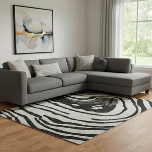 HomeRoots 10' X 14' Modern Abstract Washable Area Rug in Black, Ivory & Gray - UV Protected & Durable Design 682403