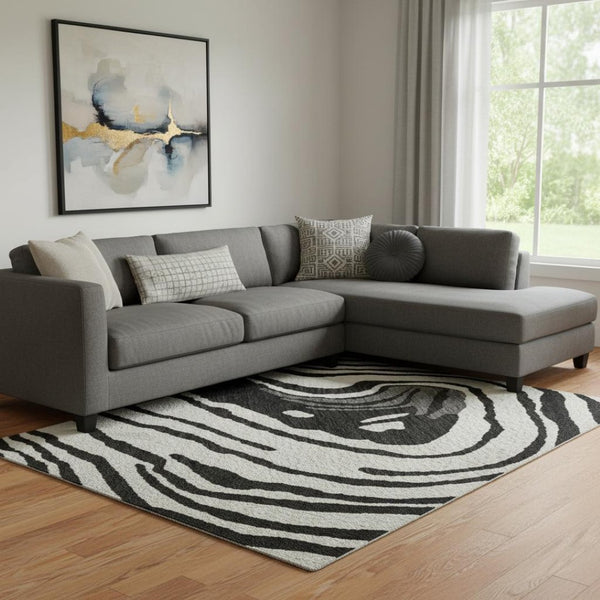 HomeRoots 10' X 14' Modern Abstract Washable Area Rug in Black, Ivory & Gray - UV Protected & Durable Design 682403