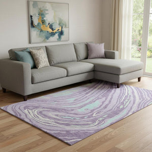 HomeRoots 10' X 14' Abstract Washable Area Rug in Lavender, Mint Green & Sky Blue - UV Protected & Durable 682433