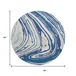 HomeRoots 8' Stylish Navy Blue, Ivory & Beige Abstract Round Rug - Washable, UV-Protected & Durable Design 682436