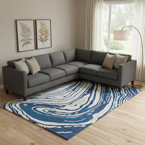 HomeRoots 9' X 12' Modern Abstract Washable Area Rug in Navy Blue, Ivory & Beige with UV Protection & Durability 682438