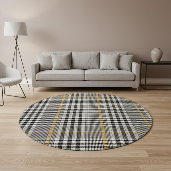 HomeRoots 8' Black Ivory and Gold Plaid Round Rug - Washable, UV Protected, Durable for High-Traffic Areas 682604