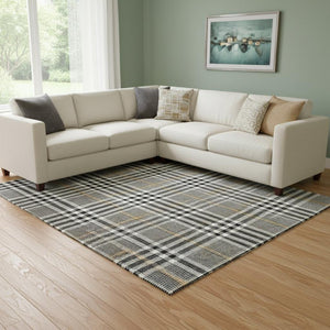 HomeRoots 10' X 14' Black Ivory & Gold Plaid Washable Area Rug with UV Protection for Stylish Living Spaces 682607