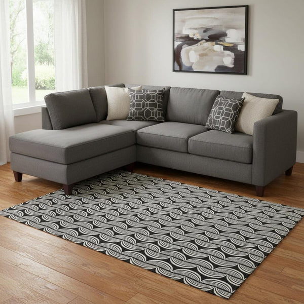 HomeRoots 8' X 10' Black and Ivory Ogee Area Rug - Washable, Stain Resistant, UV Protected for Everyday Use 682683