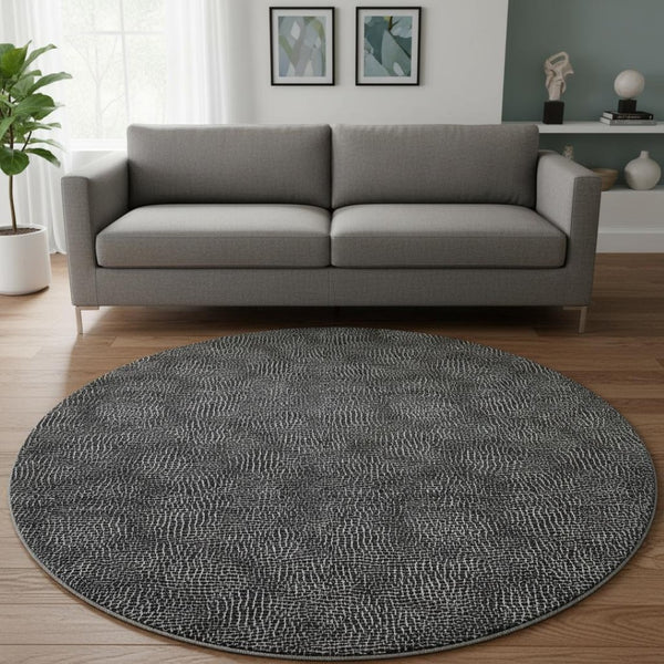 HomeRoots 8' Black and Ivory Geometric Washable Round Rug - Stylish, Durable, UV-Protected for Family Spaces 682826