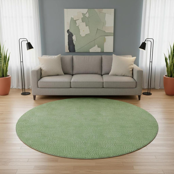 HomeRoots 8' Green and Ivory Geometric Washable Round Rug - Durable, UV-Protected, Family-Friendly Design! 682850