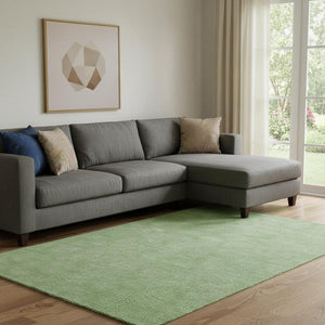 HomeRoots 10' X 14' Green And Ivory Geometric Area Rug - Washable, UV Protected, Stylish for Living Spaces 682853