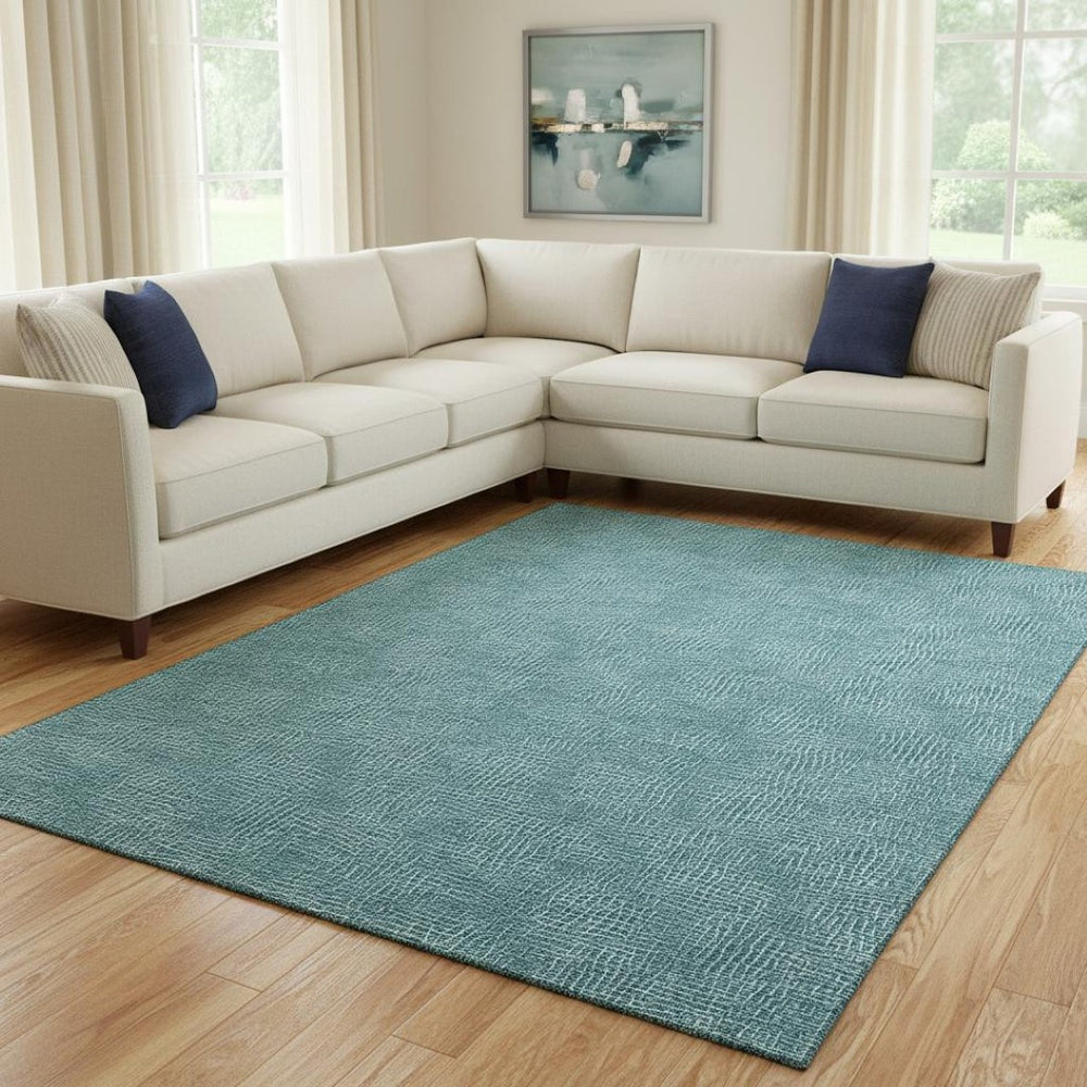 HomeRoots 10' Teal and Ivory Geometric Area Rug - Washable, UV-Protected, Durable for High-Traffic Spaces 682883