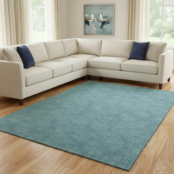 HomeRoots 10' Teal and Ivory Geometric Area Rug - Washable, UV-Protected, Durable for High-Traffic Spaces 682883