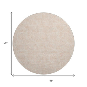HomeRoots 8' Peach and Ivory Geometric Round Rug - Washable, UV Protected, Pet-Friendly for Modern Spaces 682916