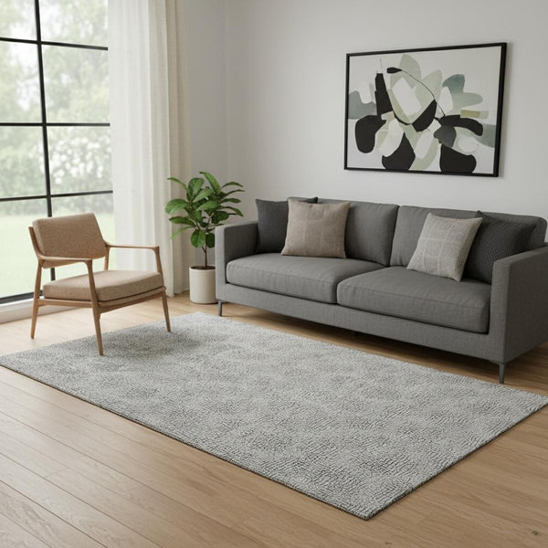 HomeRoots 5' X 8' Modern White and Black Geometric Area Rug with Stain Resistance and UV Protection Benefits 682939