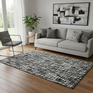 HomeRoots 5' X 8' Abstract Geometric Area Rug in Black, Ivory & Gray - Washable, UV-Protected & Pet-Friendly! 682951