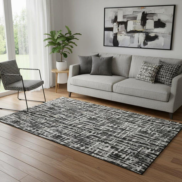 HomeRoots 5' X 8' Abstract Geometric Area Rug in Black, Ivory & Gray - Washable, UV-Protected & Pet-Friendly! 682951