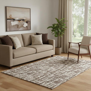 HomeRoots 5' X 8' Abstract Geometric Area Rug in Brown, Beige & Ivory - Washable, UV-Protected & Stain-Resistant 682963