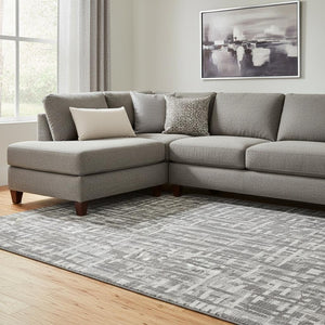 HomeRoots 8' X 10' Stylish Gray Silver Ivory Abstract Geometric Area Rug - Washable, UV-Protected & Durable! 682989