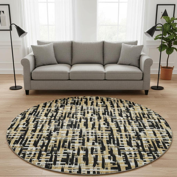HomeRoots 8' Modern Black Ivory Gold Abstract Geometric Round Rug - Washable, UV Protected & Stain Resistant 683030