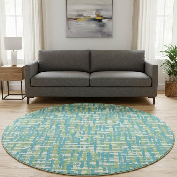 HomeRoots 8' Turquoise Green & Ivory Abstract Geometric Washable Round Rug with UV Protection & Non-Slip Backing 683084
