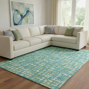 HomeRoots 10' X 14' Turquoise Green Ivory Abstract Geometric Rug - Washable, UV-Protected, Family-Friendly Design 683087