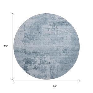 HomeRoots 8' Denim Blue and Ivory Abstract Washable Round Rug with UV Protection - Stain-Resistant Beauty! 683180