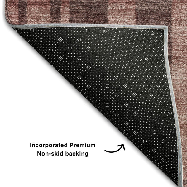 HomeRoots 5' X 8' Washable Rust and Coral Striped Area Rug with UV Protection for Stylish, Durable Spaces 683281