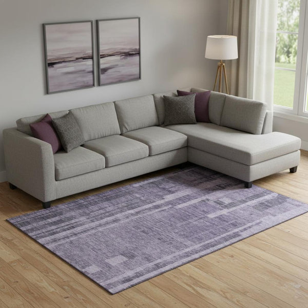 HomeRoots 10' X 14' Striking Purple & Lilac Striped Washable Area Rug with UV Protection for Any Space 683291