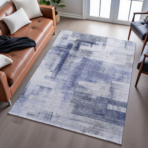 HomeRoots 5' X 8' Denim Blue & Ivory Abstract Geometric Area Rug - Washable, UV-Protected for Everyday Use! 683490