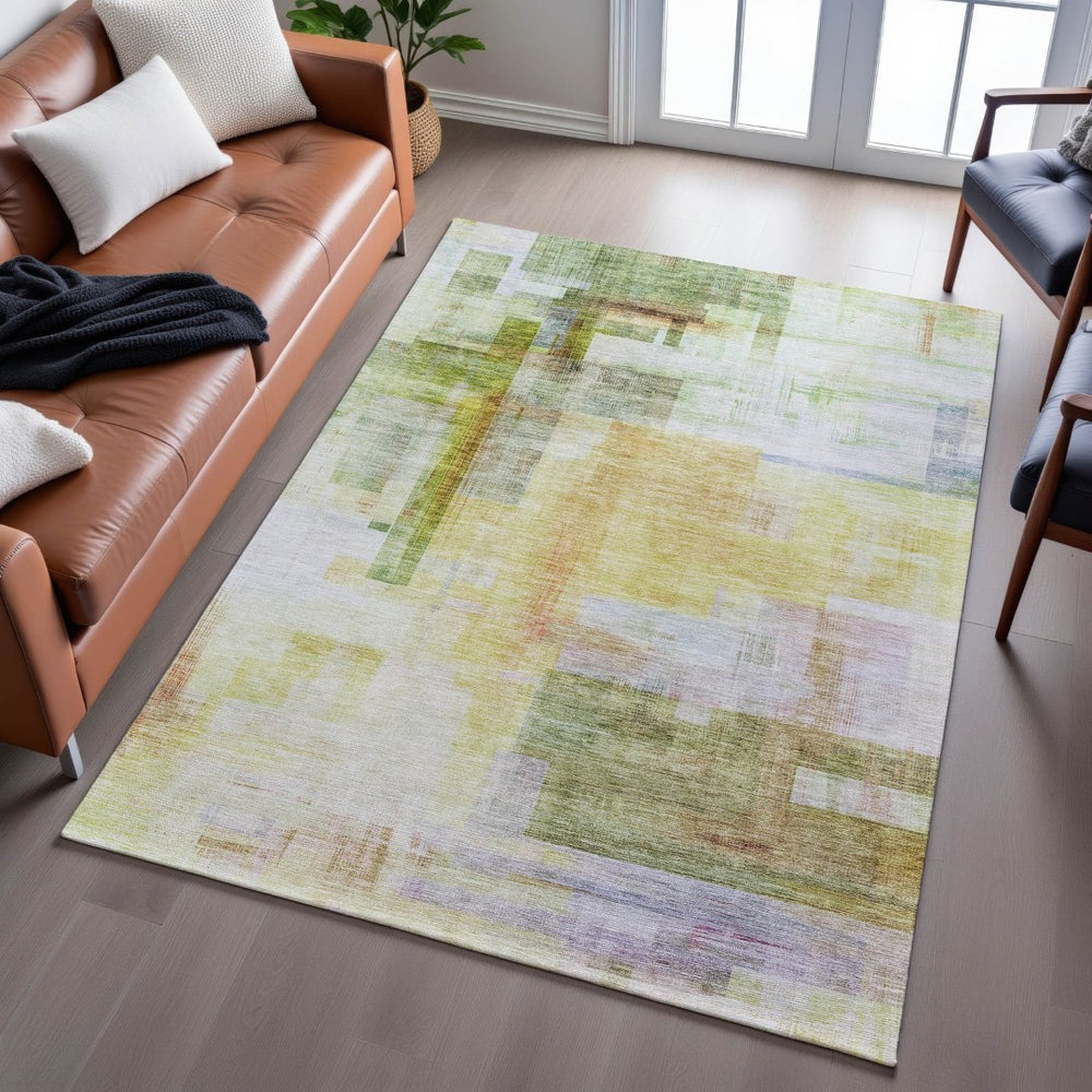 HomeRoots 5' X 8' Abstract Geometric Area Rug in Green, Ivory, Gold & Purple – Washable, UV Protected & Stylish! 683496