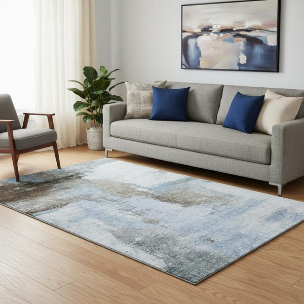 HomeRoots 5' X 8' Abstract Area Rug in Blue, Ivory & Charcoal - Washable, UV-Protected, Stain-Resistant Design 683508
