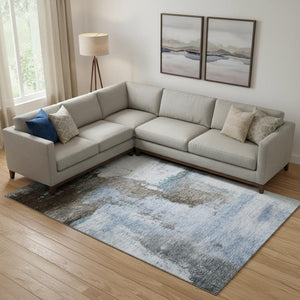 HomeRoots 9' X 12' Abstract Washable Area Rug in Blue, Ivory & Charcoal - Stain-Resistant with UV Protection 683511