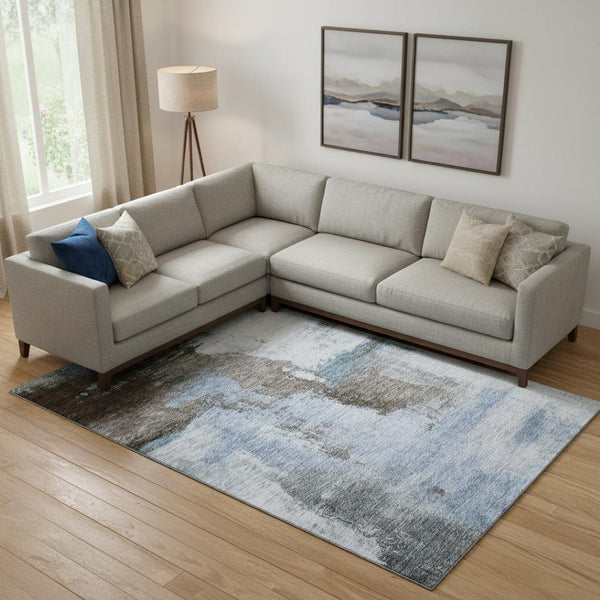 HomeRoots 9' X 12' Abstract Washable Area Rug in Blue, Ivory & Charcoal - Stain-Resistant with UV Protection 683511