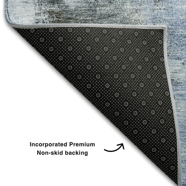 HomeRoots 9' X 12' Abstract Washable Area Rug in Blue, Ivory & Charcoal - Stain-Resistant with UV Protection 683511