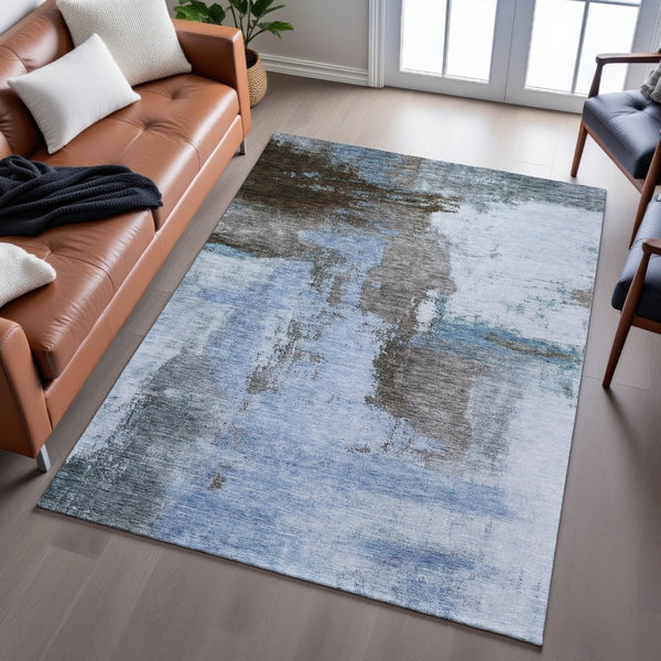 HomeRoots 9' X 12' Abstract Washable Area Rug in Blue, Ivory & Charcoal - Stain-Resistant with UV Protection 683511