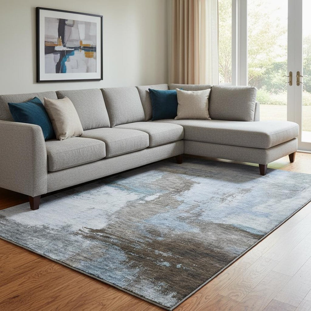 HomeRoots 10' X 14' Abstract Area Rug in Blue, Ivory, and Charcoal - Washable, UV Protected, Stain Resistant Decor 683512
