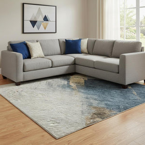 HomeRoots 10' X 14' Modern Abstract Taupe & Blue Area Rug - Durable, Washable, UV Protected for High Traffic Spaces 683602