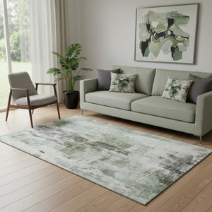 HomeRoots 5' X 8' Mint Green Abstract Area Rug - Washable, UV Protected, Stain Resistant for High-Traffic Rooms 683706